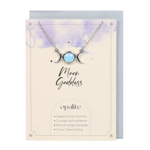 Opalite Triple Moon Necklace & Card.  This inspiring 'Moon Goddess' greeting card features a silver-tone triple moon necklace accented by an opalite stone. Opalite is a manmade stone reminiscent of opal and moonstone, used to promote courage and remove energy blockages. 22cm chain with lobster clasp closure.  Nickel-free stainless steel. Includes envelope. Card left blank inside.  Measures 35cm x 10.5cm x 0.2c.m